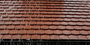 rain on red clay tile roof